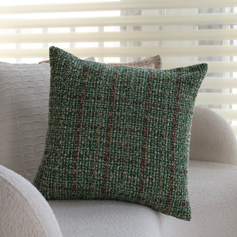 Quadratischer Bouclé-Kissenbezug im Tweedstil mit dezentem Multicolor‑Tufting Brehn