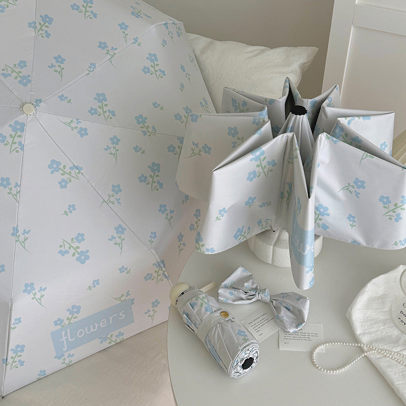 Damen Faltender Regenschirm mit stilvollem Blumendesign Brehn