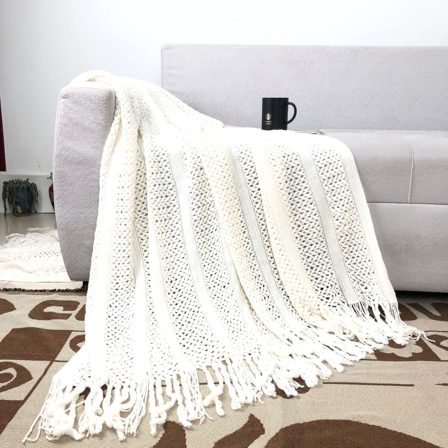 Handgefertigte strukturierte Strickdecke Brehn