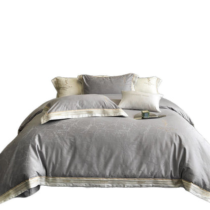 Luxuriöses Satin-Bettwäsche-Set mit dezenter Marmorstruktur und goldener Stickbordüre