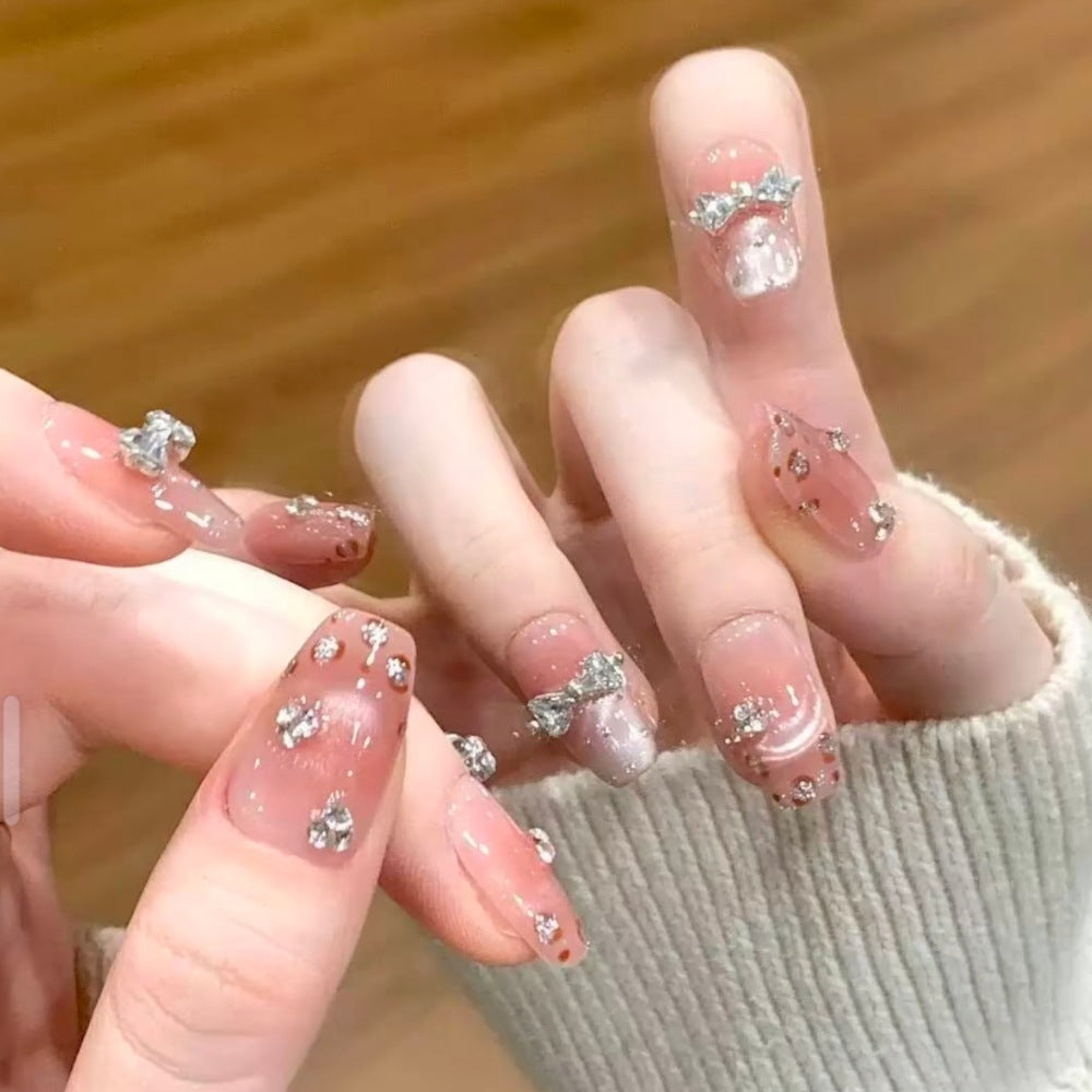 Dekoratives Strass-Bow Press-On Nagelset Brehn