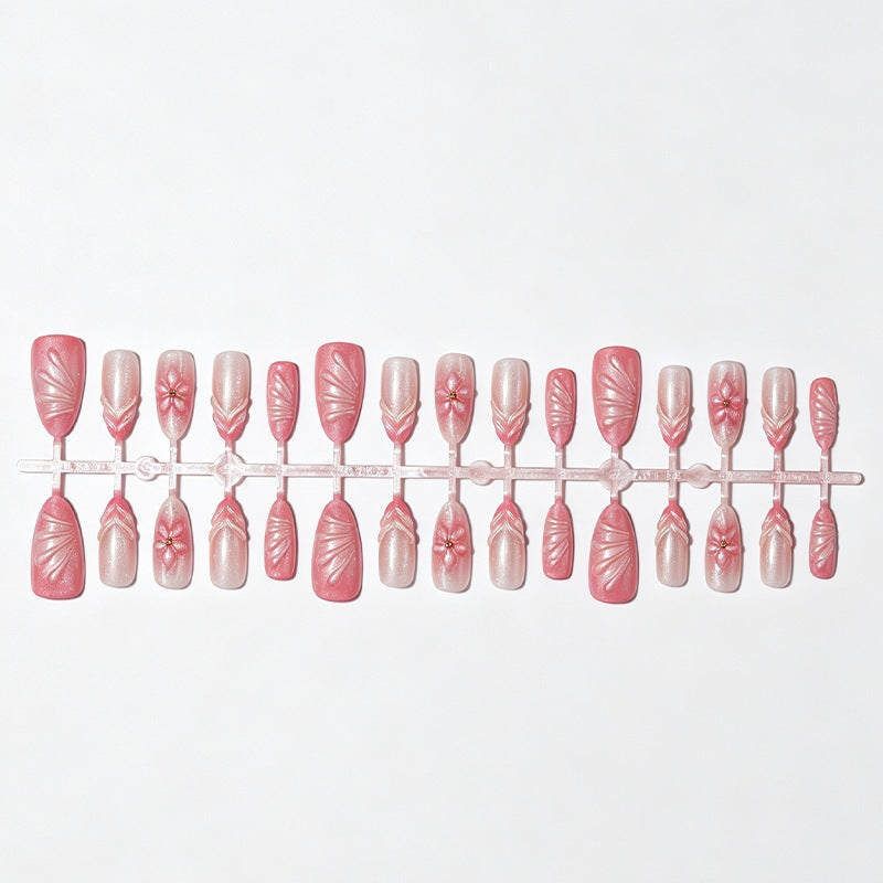 Kunstnagelset mit filigranen Blüten und Glitzerakzenten Brehn