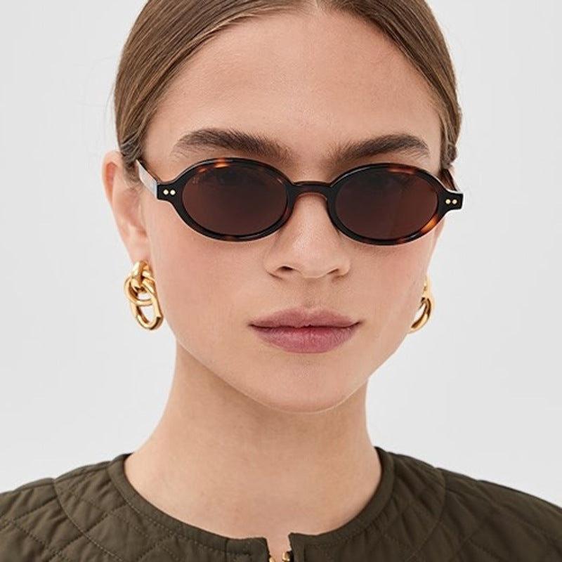 Damen modische ovalförmige Sonnenbrille mit ausgefallenem Rahmen Brehn