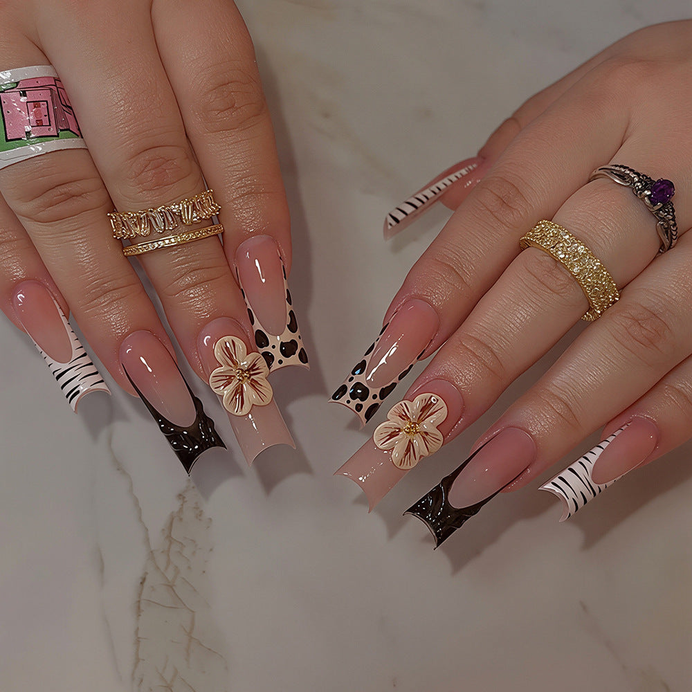 Künstlerische Press-On Nagelkunst Tipps mit floralen und Tierdruckdesigns Brehn