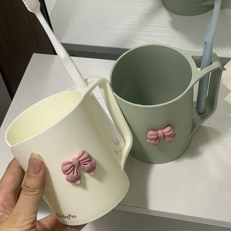 Keramiktasse mit Elegantem Schleifenmotiv Brehn