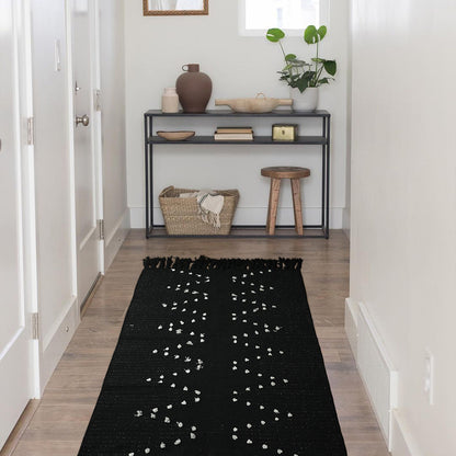 handgewebter Wohnzimmer-Teppich mit Fransen und geometrischem Lochmuster Brehn