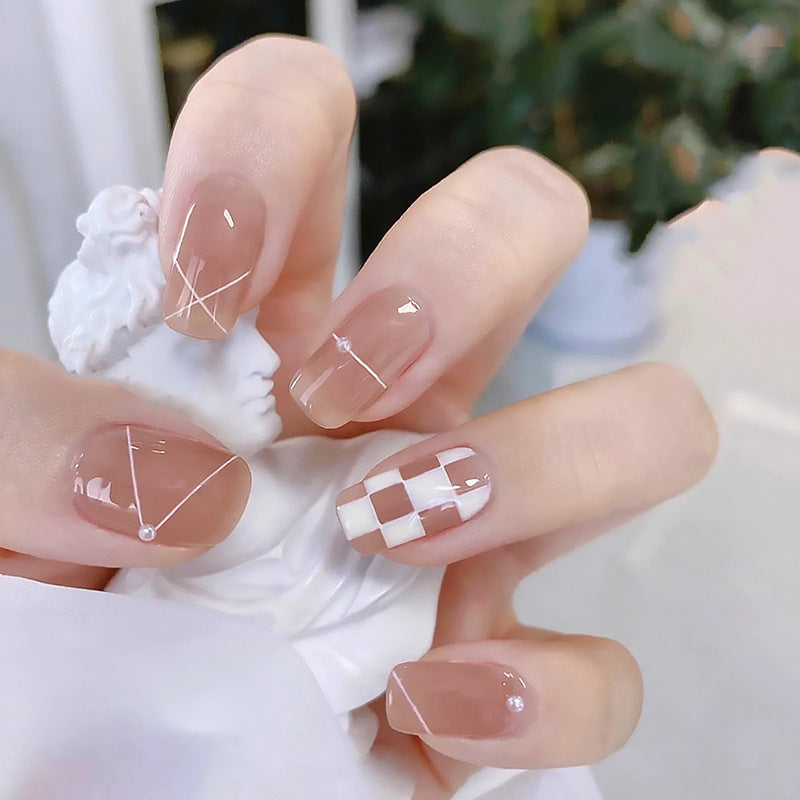 Kunstnagelset mit funkelnden Glitzer- und holografischen Akzenten Brehn