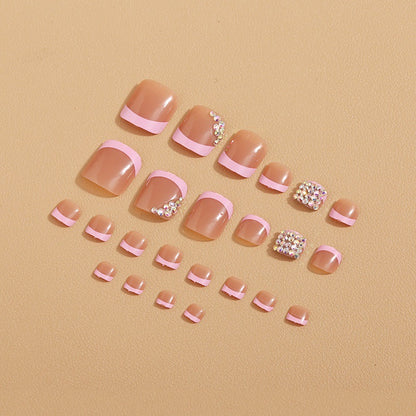 Fußnagelkunst mit Glitzersteinen Brehn