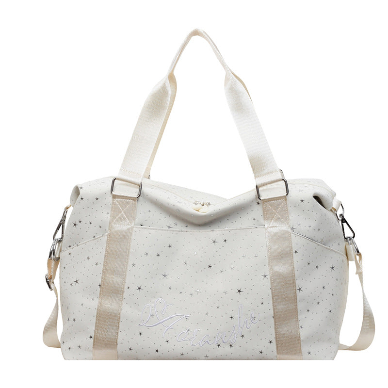 Stylische mit Sternen verzierte Reisetasche