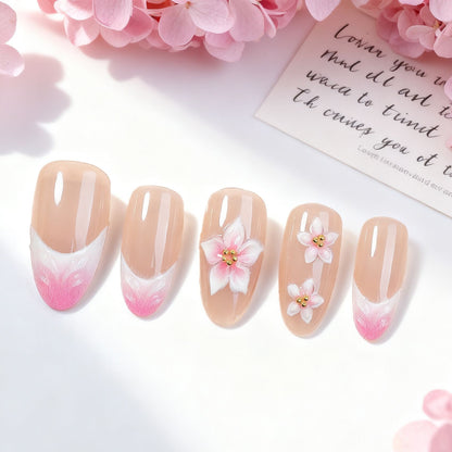 Kunstnagelset mit eleganten Blumendesigns und zarten Farbverläufen Brehn