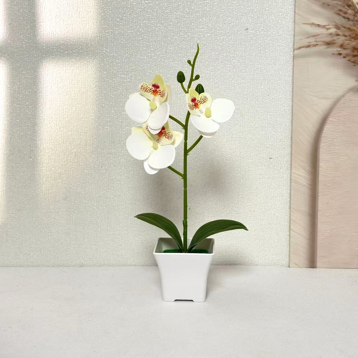 Künstliche Orchideenarrangements für Wohn- und Bürodeko