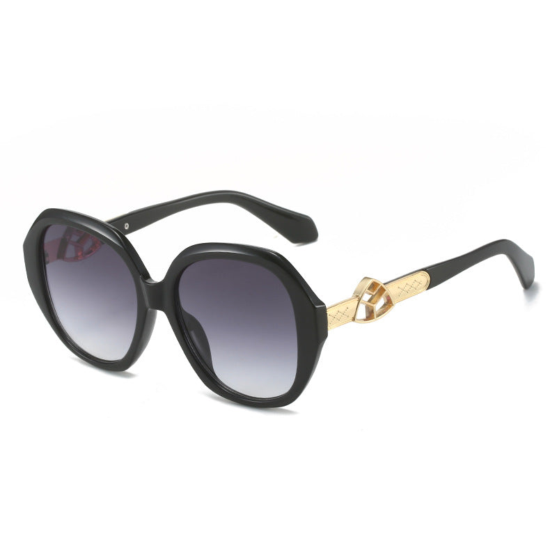 Damen Oversized Sonnenbrille mit goldenen Akzenten Brehn
