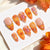 Künstlerisches, blumenmotiviertes Press-On Nail Set Brehn
