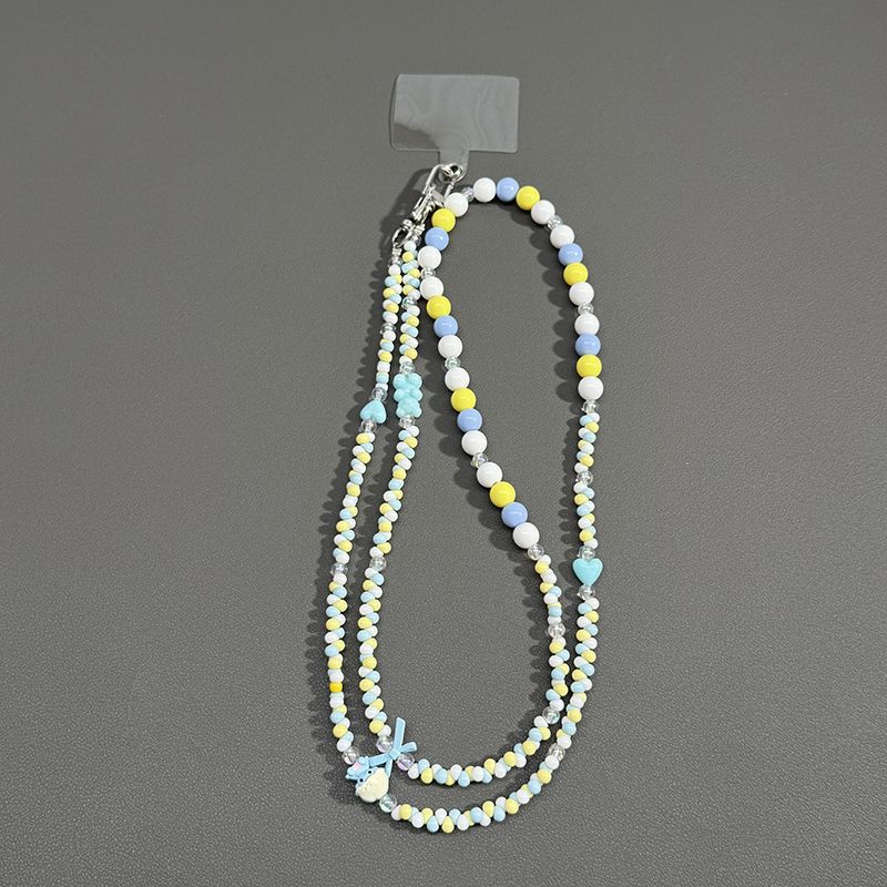 Perlenbrille Kette mit Schmetterlingsakzenten Brehn