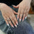 Künstlerisches Floral Press-On Nagelset Brehn