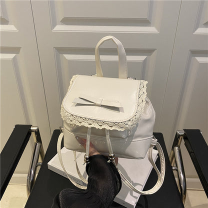 Niedlicher Mini-Rucksack mit Spitzenbesatz Brehn