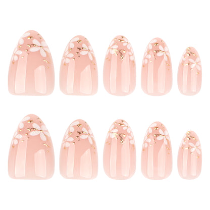 Kunstvolle Nagelkunst mit Floral-Design und Glitzerakzenten Brehn