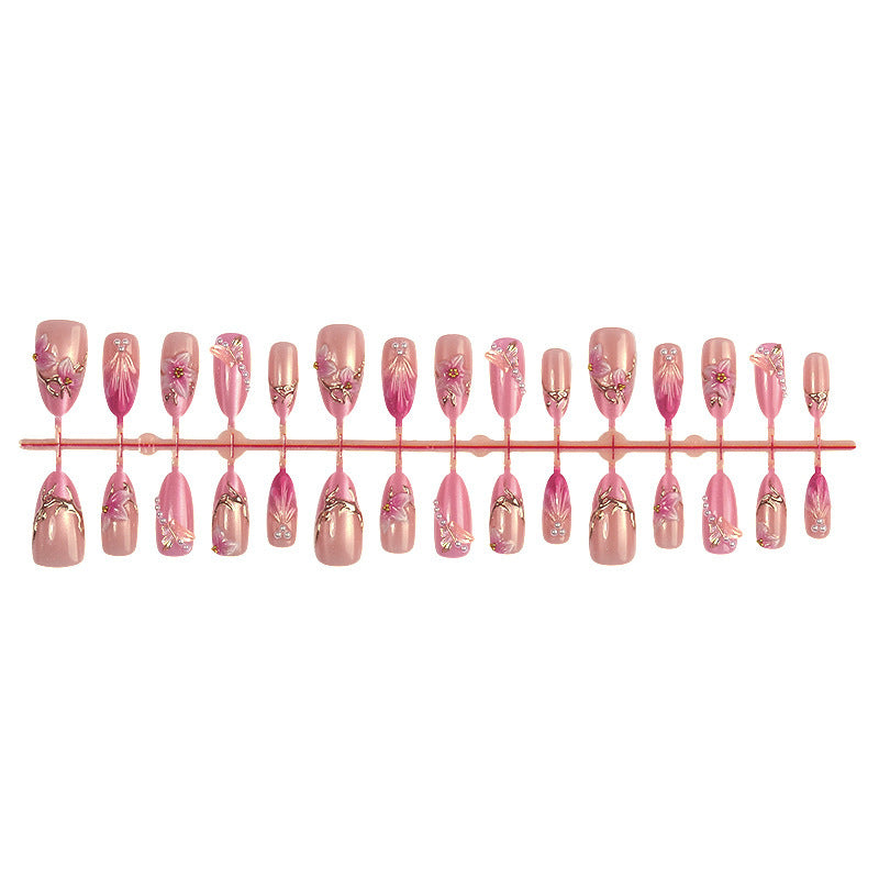 Kunstnagelset mit floralen und glitzernden Designs Brehn