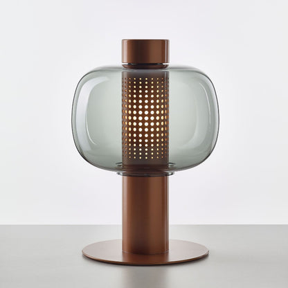 Künstlerische Tischlampe mit elegantem Glasschirm