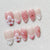 Künstlerisches Floral Press-On Nagelset mit 3D Akzenten Brehn