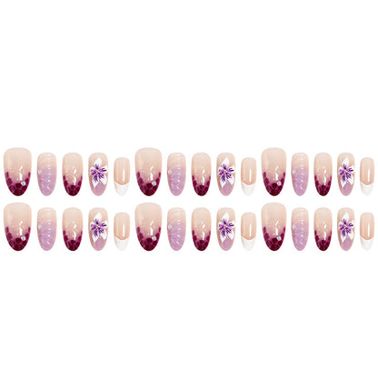 Kunstnagelset mit elegantem Ombre-Design und floralen Akzenten Brehn