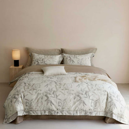 Wendbare Baumwollsatin Blumenbettwäsche mit besticktem Saum und Kopfkissenbezügen