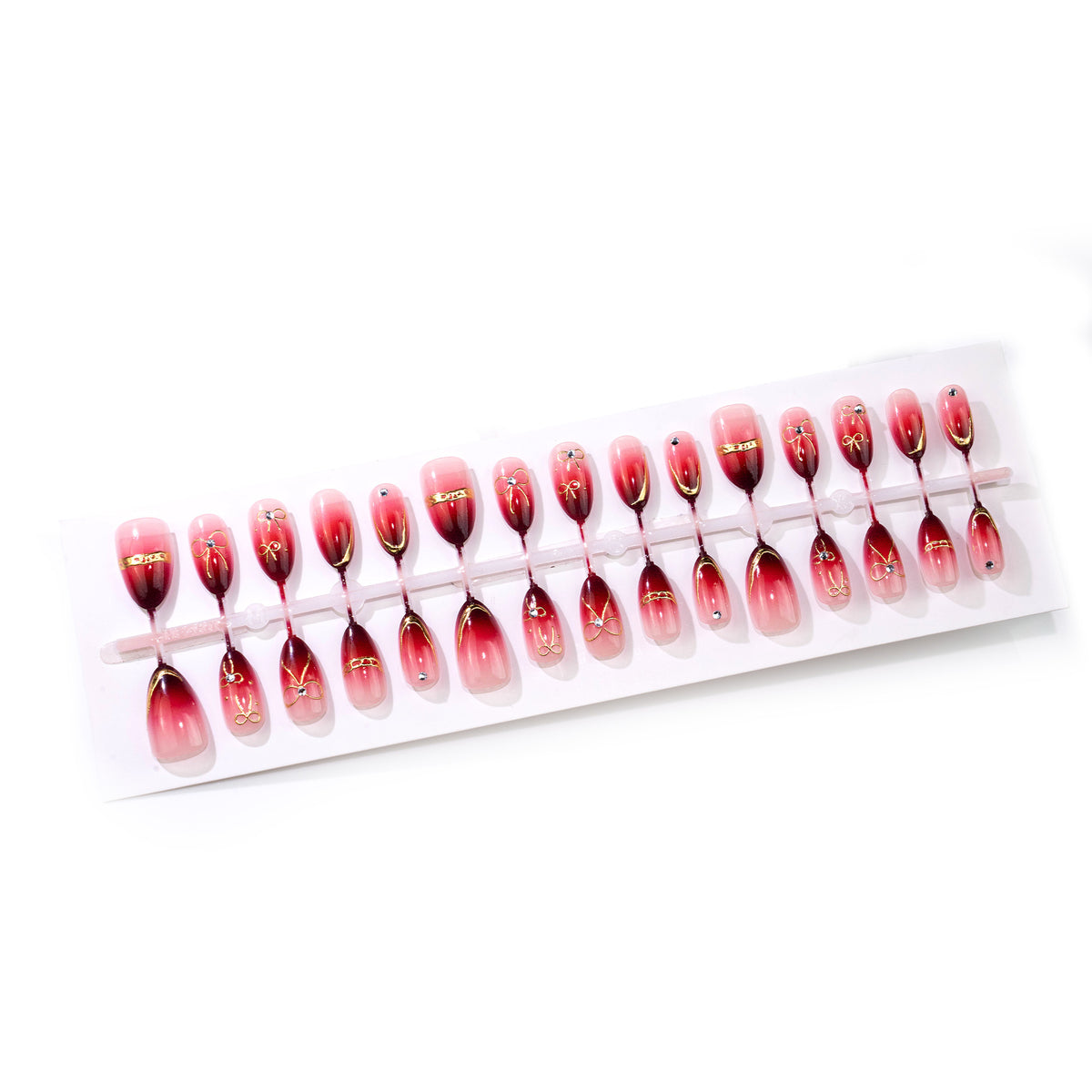 Künstlerisches Ombre Press-On Nail Art Set mit goldenen Akzenten Brehn