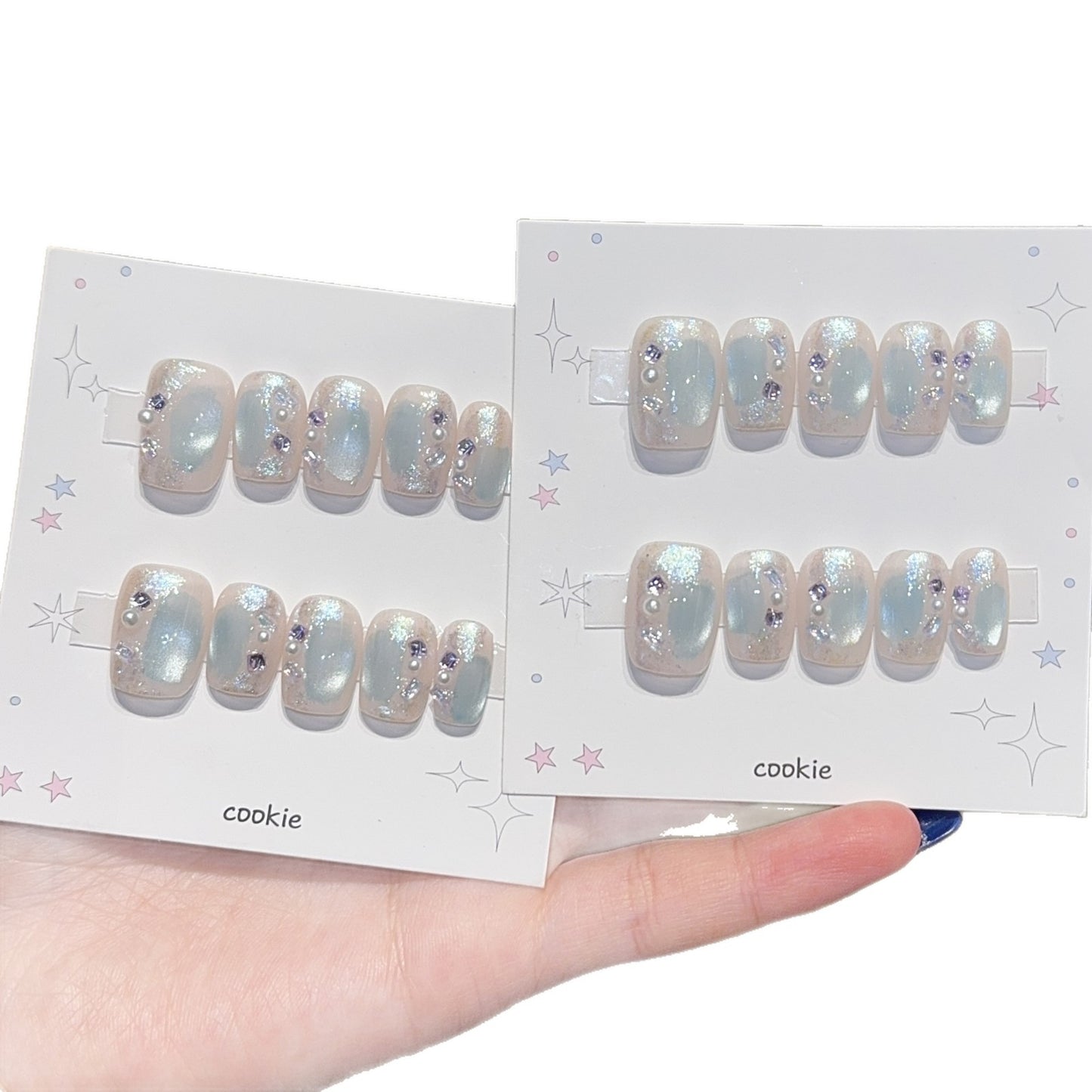 Kunstnägel mit Perlen- und Glitzerschmuck Brehn