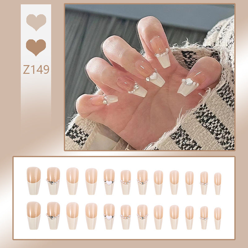 Kunstnagelset mit eleganten Glitzerverzierungen und schimmernden Akzenten Brehn
