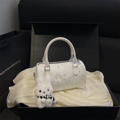 Stylische mit Sternen verzierte Handtasche