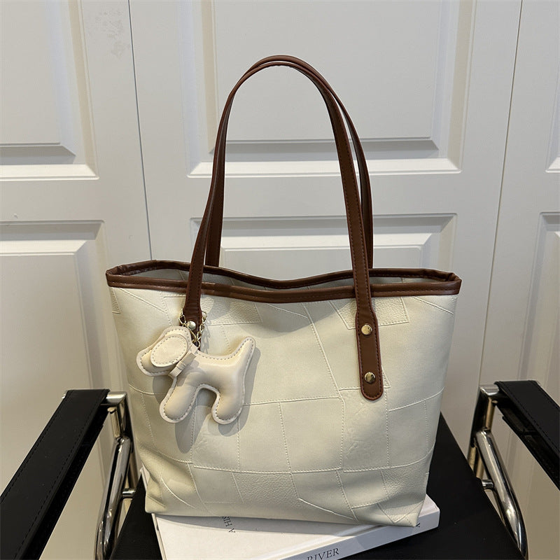 Stylische strukturierte Tragetasche mit dekorativem Charme