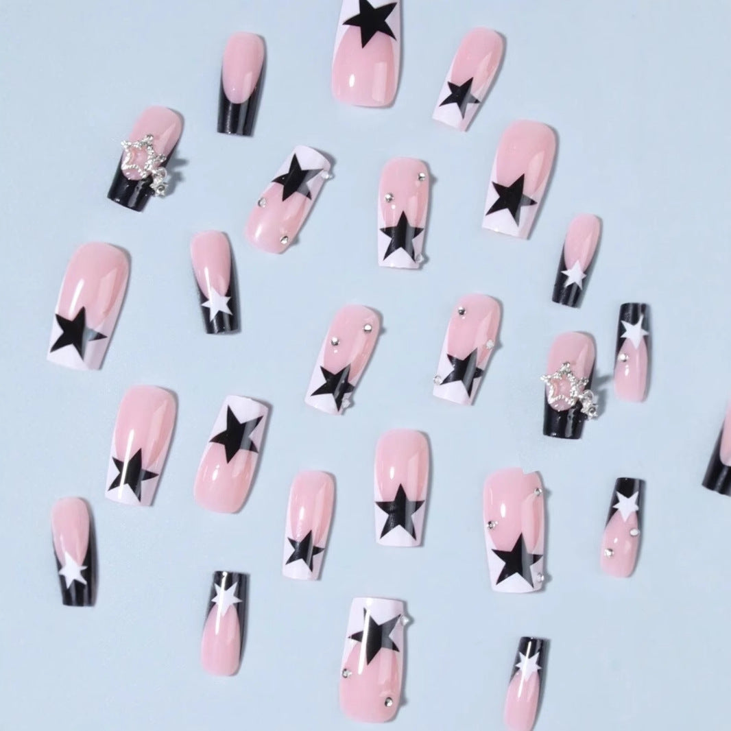 Kunstnagelset mit glitzernden Sternen-Akzenten Brehn