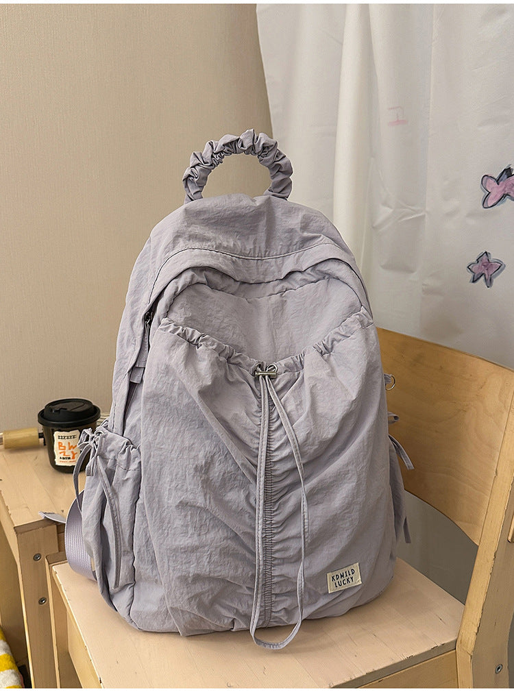 Lässiger zerknitterter Stoff-Schulrucksack