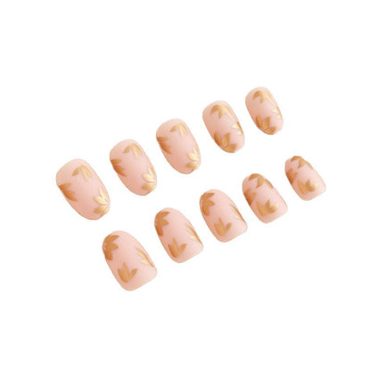 Elegantes Goldblatt-Press-On-Nageldesign