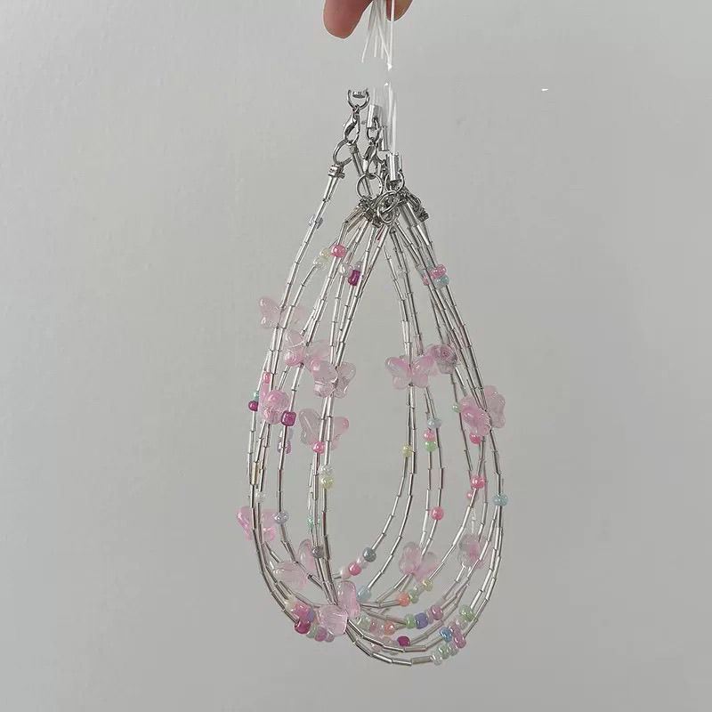Dekorativer Schmetterlings Charm Brillenband Brehn