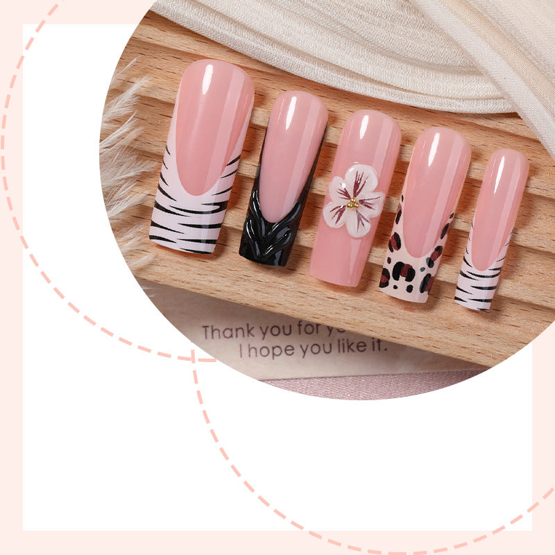 Künstlerisches Nagelkunst Press-On Set mit Blumen- und Tiermustern Brehn