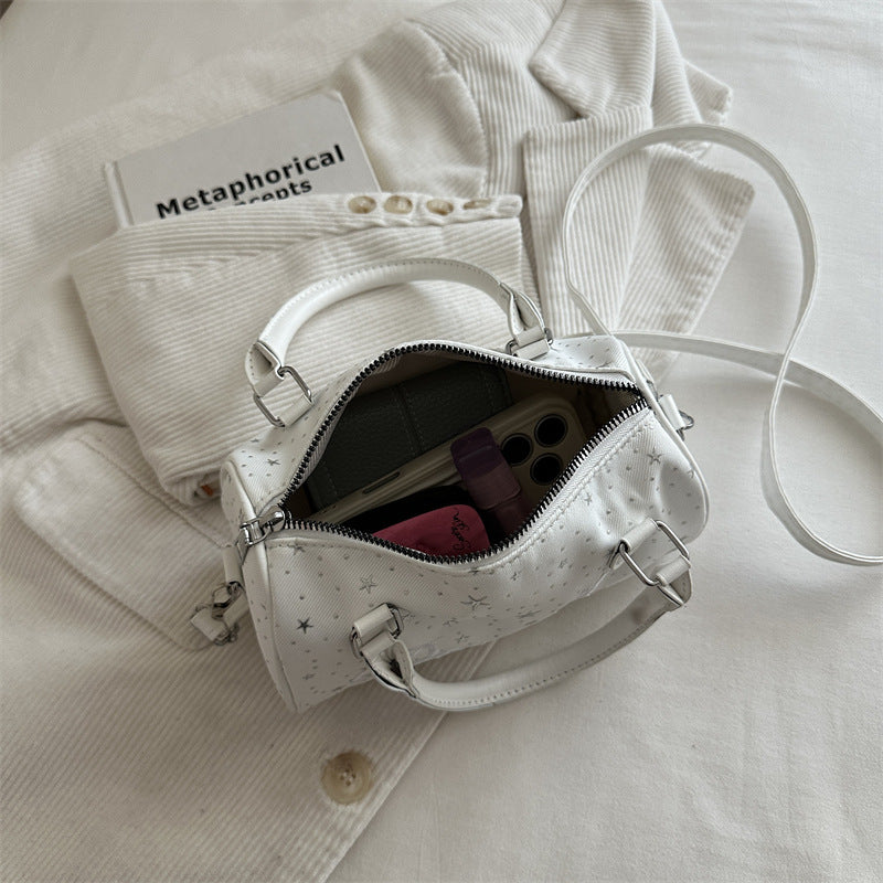 Stylische mit Sternen verzierte Handtasche