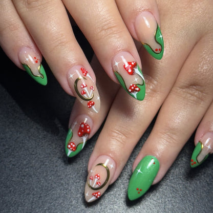 Künstlerische Stiletto-Nagelverlängerungen mit floralen Akzenten Brehn