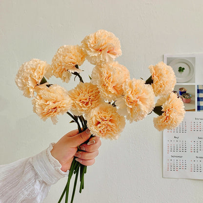 Dekoratives Blumenmittelstück für Tischdekoration