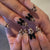 Künstlerisches Press-On Nagelset mit Leopardenmuster und Schleifenakzenten Brehn