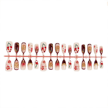 Kunstnagelset mit eleganten floralen Designs und Glitzereffekt Brehn