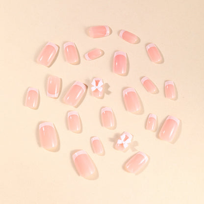 Elegante French Tip Nagelkunst mit Bow Verzierungen Brehn
