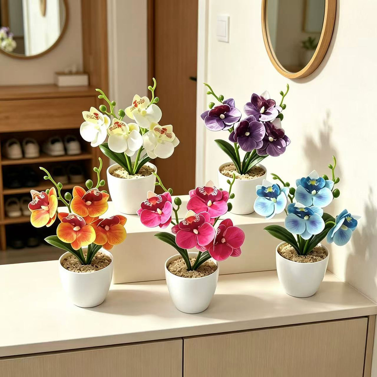 Elegante synthetische Orchideenarrangement