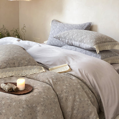 Reversibles Baumwollsatin-Bettwäscheset mit feiner Jacquard-Struktur und Spitzenkante