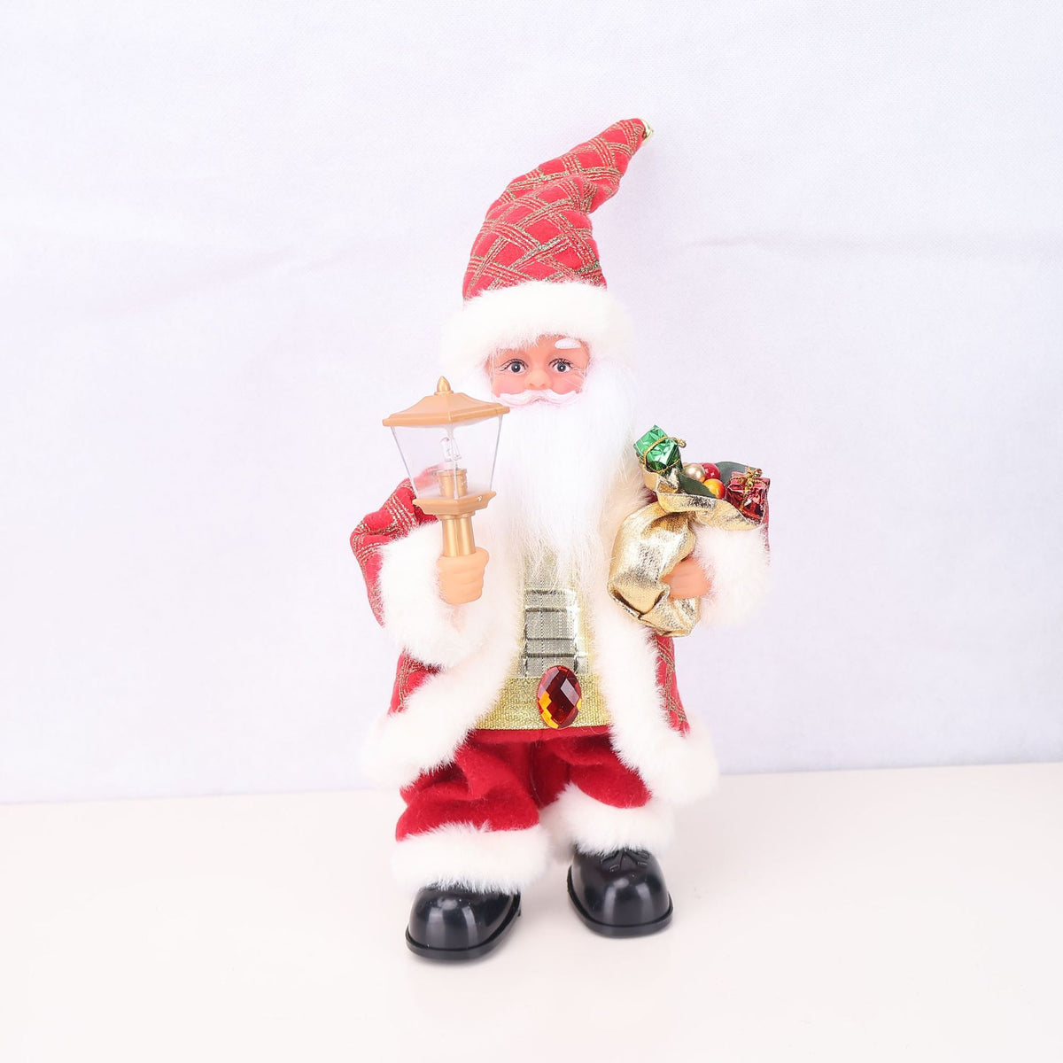 Dekorative Weihnachtsmannfigur mit Süßigkeit