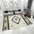Geometrisch gemusterter Teppich 1786779209