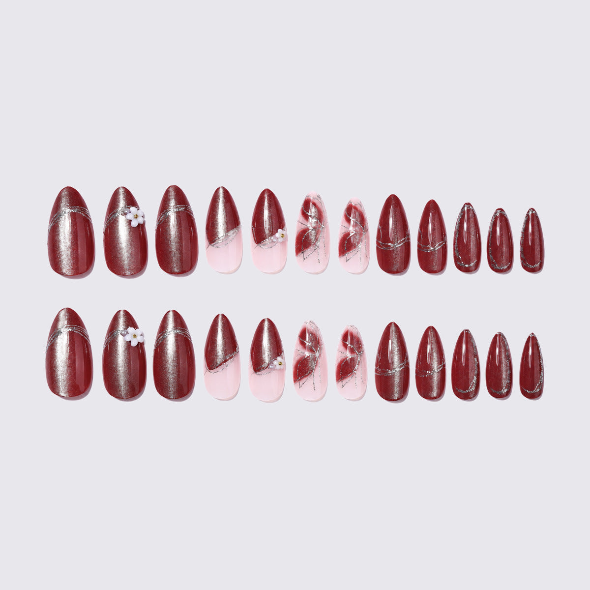 Elegantes Kunstnagelset mit Glitzer- und Blütenverzierungen Brehn