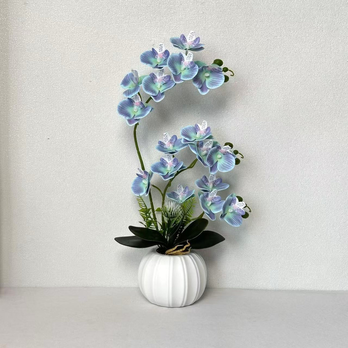 Elegante künstliche Orchideenblütenarrangement