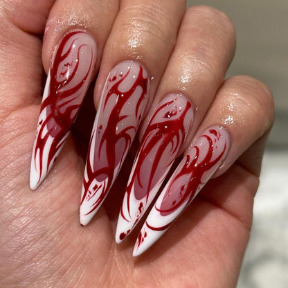 Kunstvolle Nagelverlängerungen mit kreativen Augen-Design Brehn