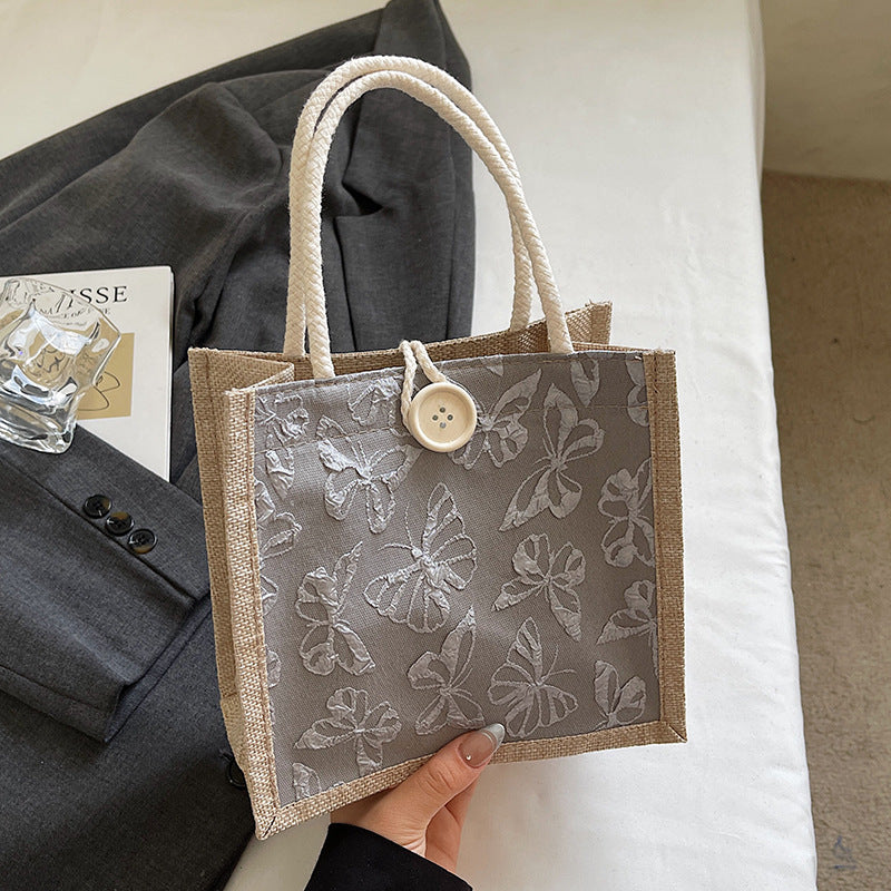 Schmetterling bestickte Stofftasche